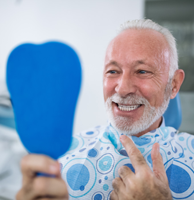 a patient smiling with confidence