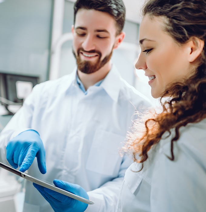 Dentists reviewing patient charts