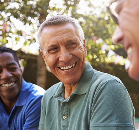 Man smiling after restorative dentistry