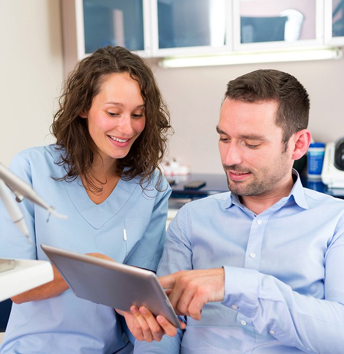 Man talking to a dentist
