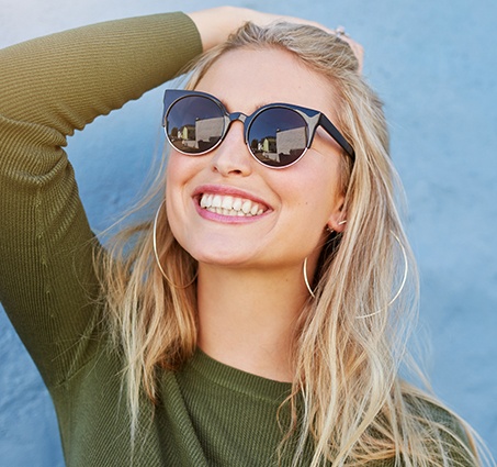 Woman with gorgeous smile after cosmetic dentistry