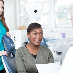 Patient learning about how to get dental implants in Chelsea