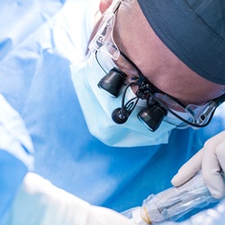 Closeup of Chelsea implant dentist working on patient