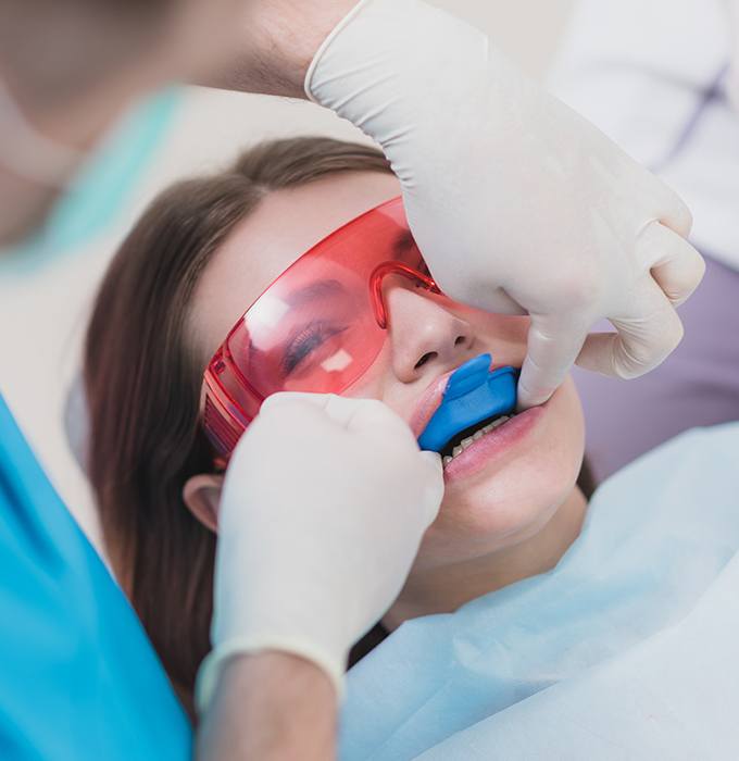 Patient receiving fluoride treatment