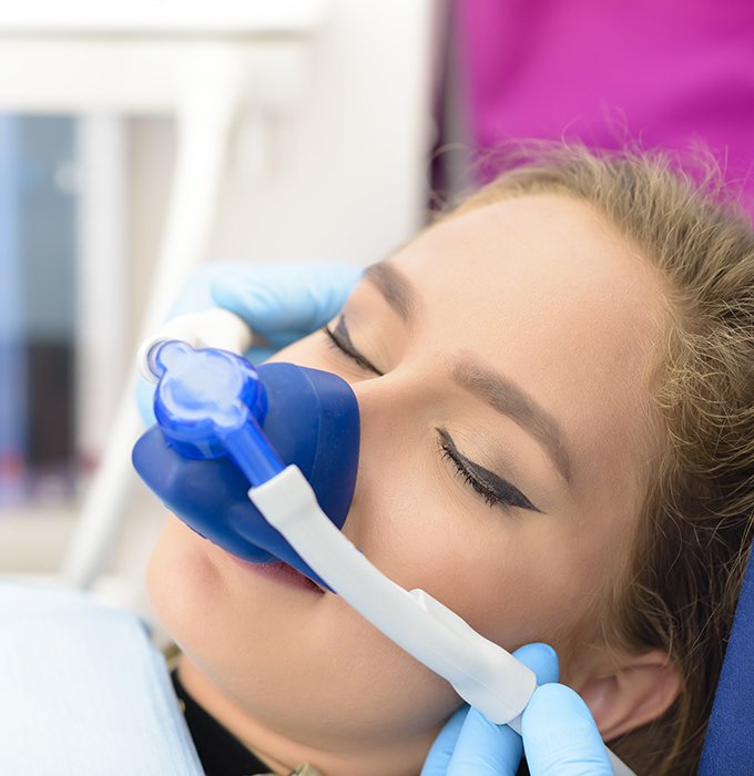 Patient with nitrous oxide dental sedation mask