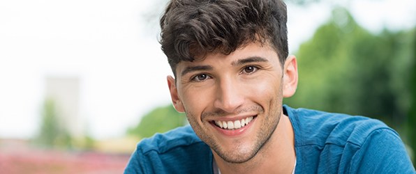 Man with straight smile after orthodontics