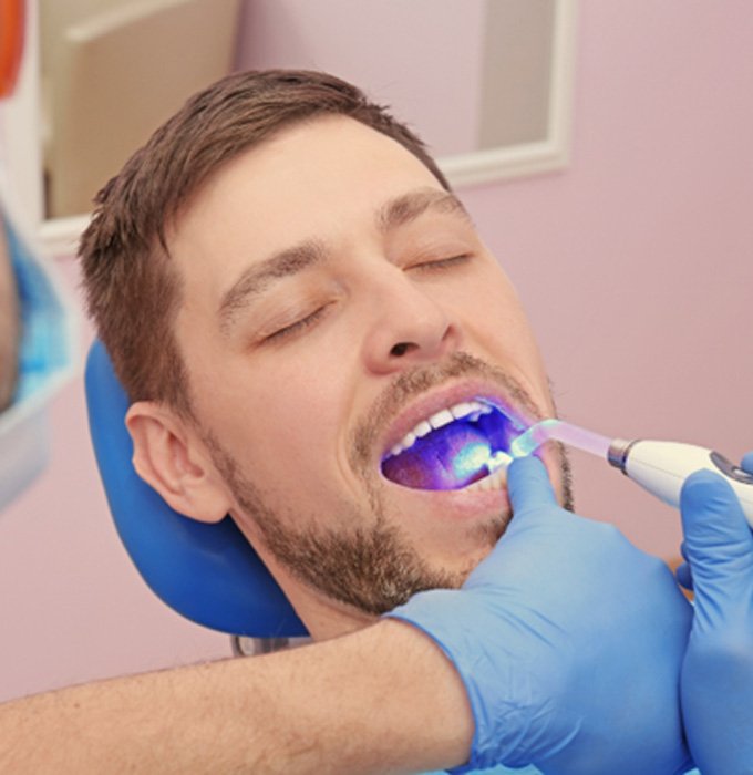 Dental patient receiving tooth-colored filling in Chelsea 