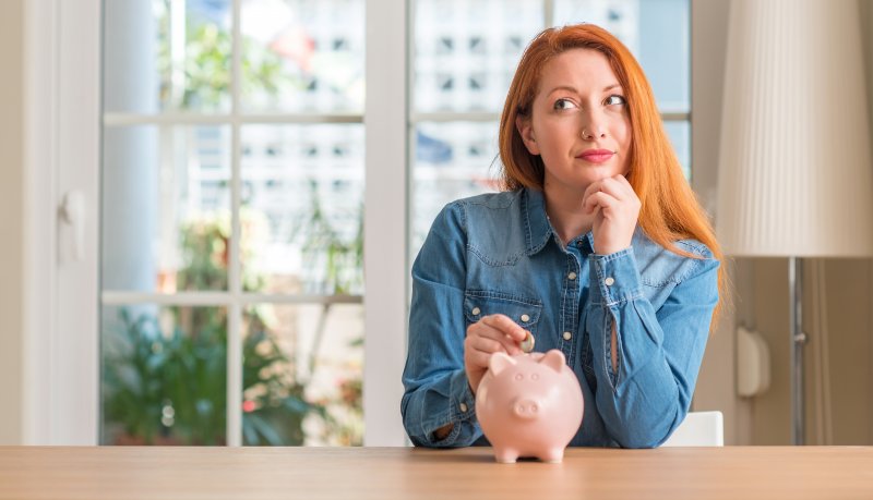 Woman with piggy bank